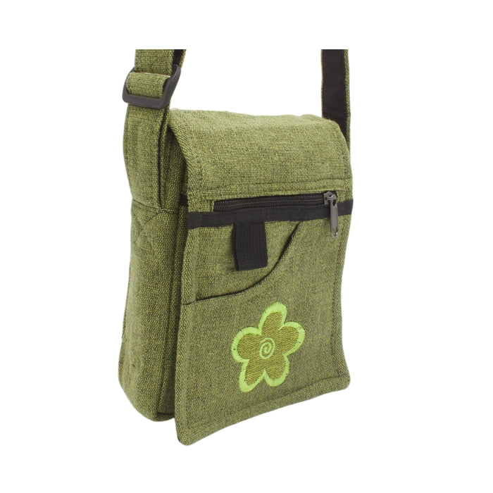 A green passport bag with a zipper, external pocket, and an embroidered flower on the front.