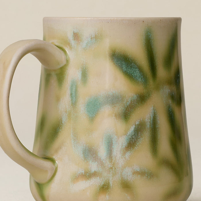 Close-up details of hand-thrown mug by Rookwood