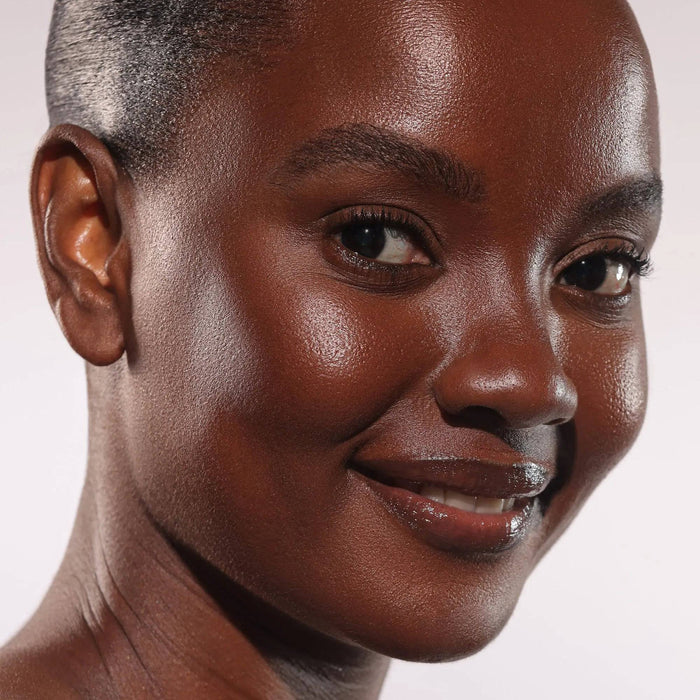 HY-GEN Skincare Infused Glow Beautifier in shade 04 model look on a white background.