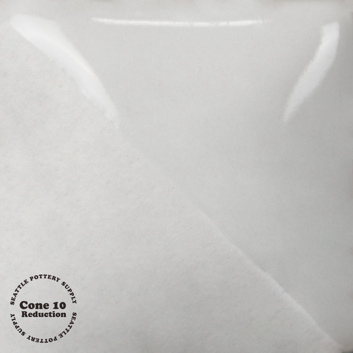 Mayco UG051 China White underglaze tile at cone 10 reduction, bright white with a glossy half and a matte half