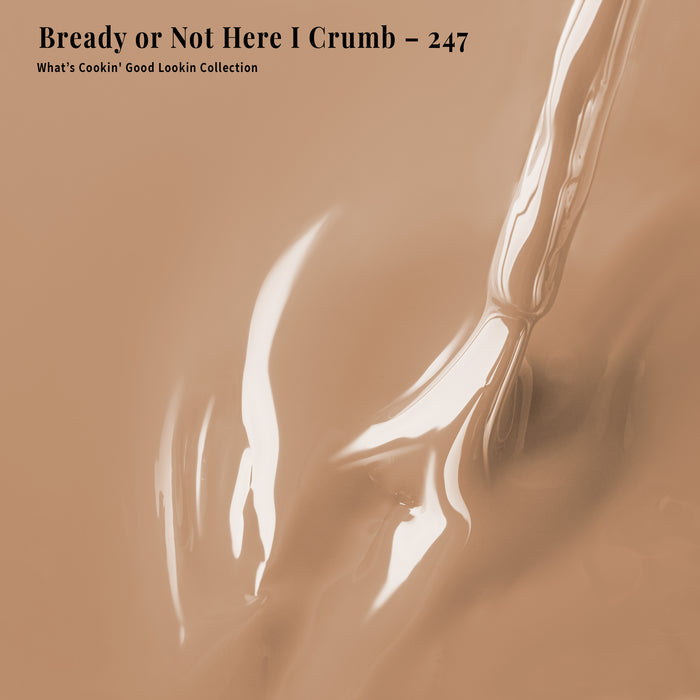 Brown nail polish with a brush, featuring text 'Bready or Not Here I Crumb - 247' and 'What's Cookin' Good Lookin' Collection'.