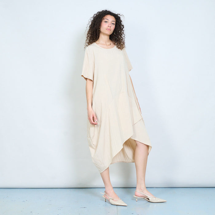 Asymmetric hem loose fit midi dress with short sleeves and draped panel detail wholesale