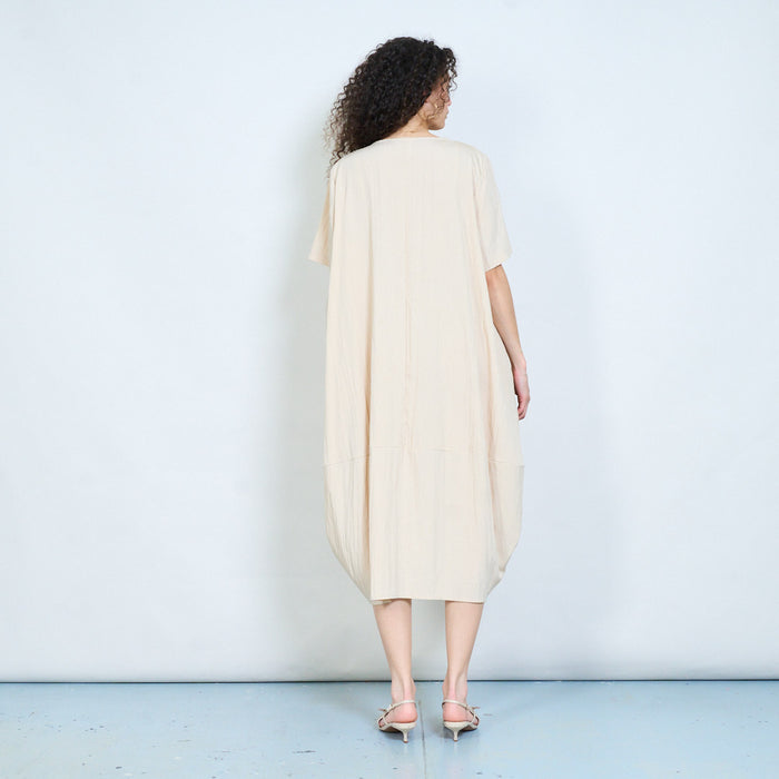 Asymmetric hem loose fit midi dress with short sleeves and draped panel detail wholesale