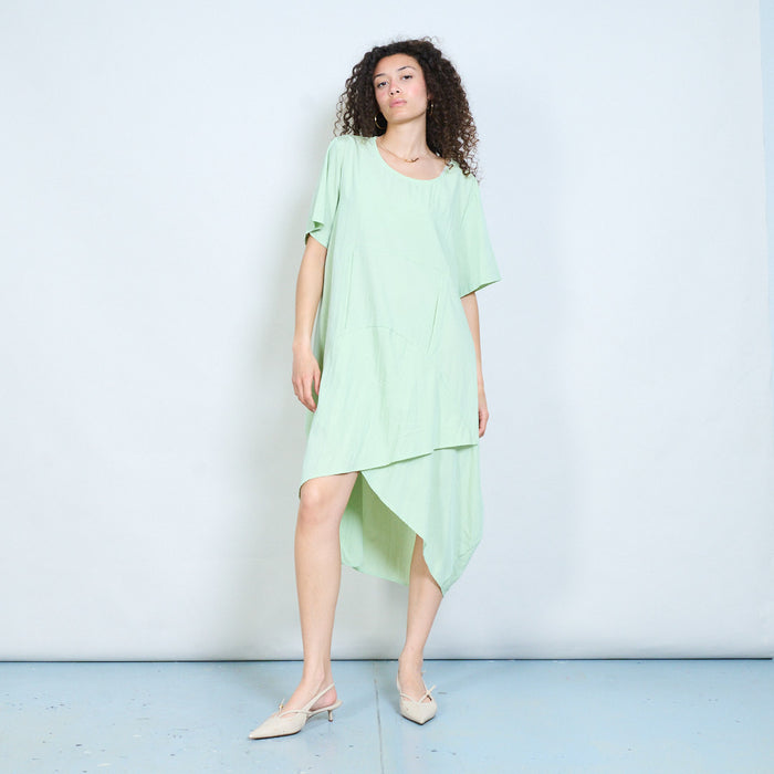Asymmetric hem loose fit midi dress with short sleeves and draped panel detail wholesale