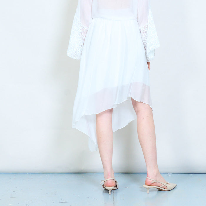 Asymmetric sheer overlay skirt wholesale