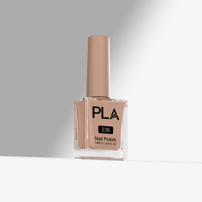 Nail polish bottle with beige color and 'PLA' branding on a gray background