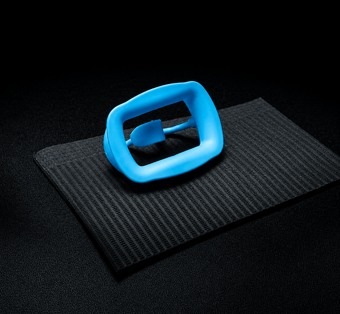 Black 3-ply waterproof dental bib with blue bib clip on designed for teeth whitening studios