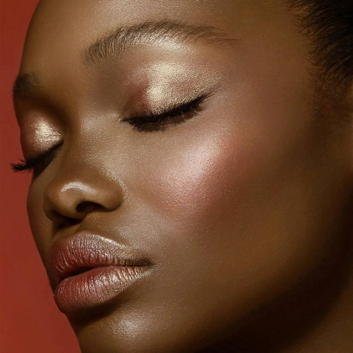 Bloom Face Palette model look on a red background.
