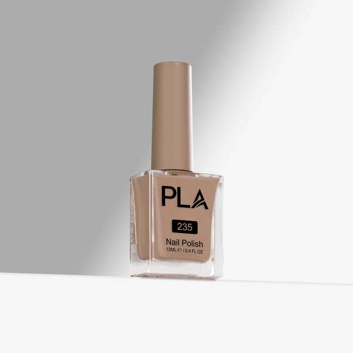 Nail polish bottle with beige color and 'PLA' branding on a gray background