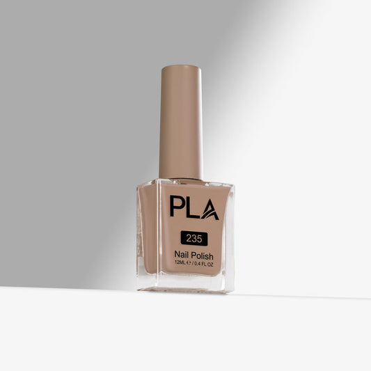 Nail polish bottle with beige color and 'PLA' branding on a gray background