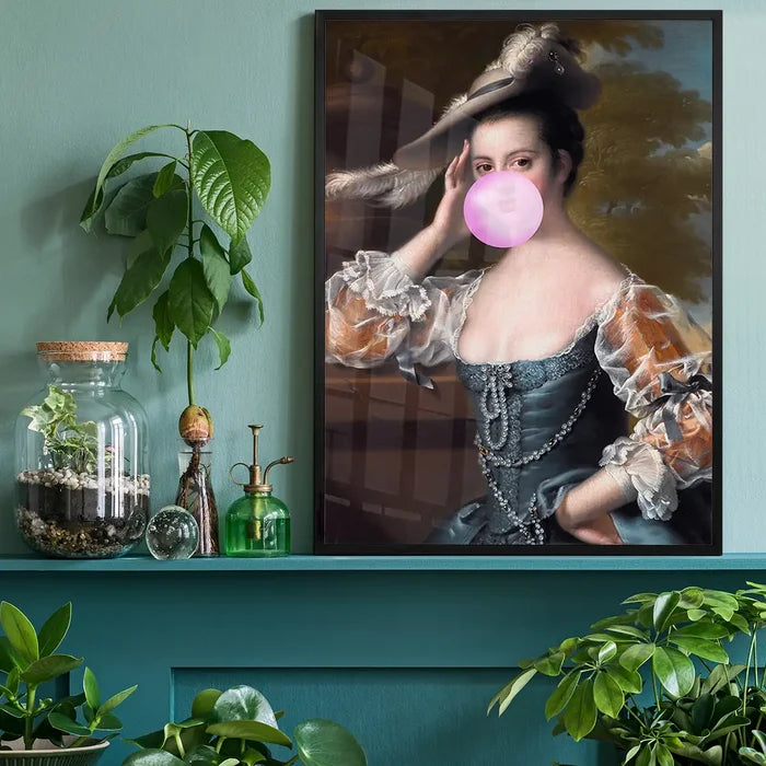 Bubblegum Lady Portrait Print, quirky altered art print black framed on a living room shelf