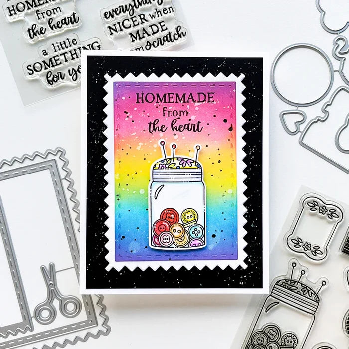 Catherine Pooler - Dies - A Cut Above. The A Cut Above Dies is a pinking cut edge frame die with layers and a little sewn tag die. The tiny snips are just the cutest addition! Available at Embellish Away located in Bowmanville Ontario Canada. Eaxample by brand ambassador.