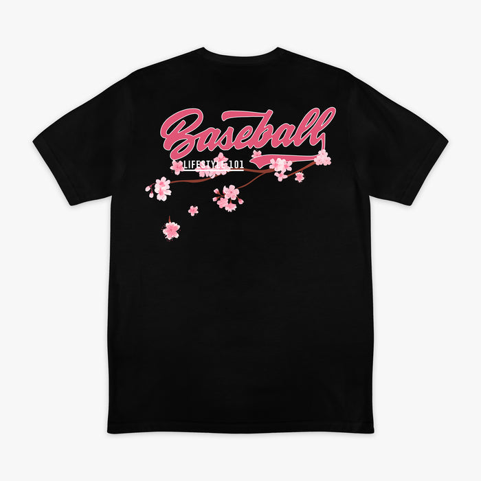 Back of black BL101 tee with pink "Baseball" script and cherry blossom branch graphic, flat lay view