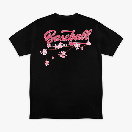 Back of black BL101 tee with pink "Baseball" script and cherry blossom branch graphic, flat lay view