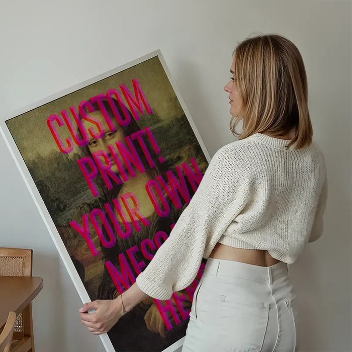 Custom Mona Lisa Quote Print held up against a living room wall