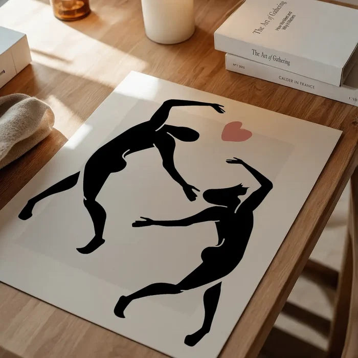 Dancers Black And White Painting Print unframed on a home office desk