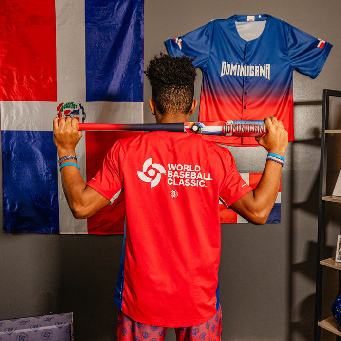 Adult model wearing red Diamond Tech Vented Dominican Republic graphic tee