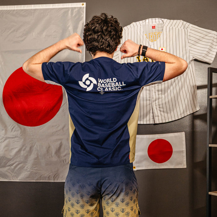 Adult model wearing navy Diamond Tech Vented Japan graphic tee