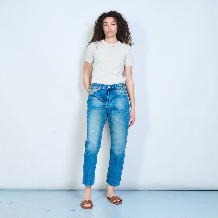 Distressed straight-leg cropped denim jeans with frayed hem detail wholesale