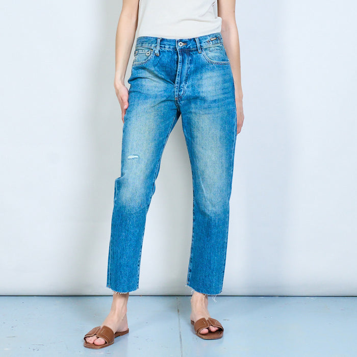 Distressed straight-leg cropped denim jeans with frayed hem detail wholesale