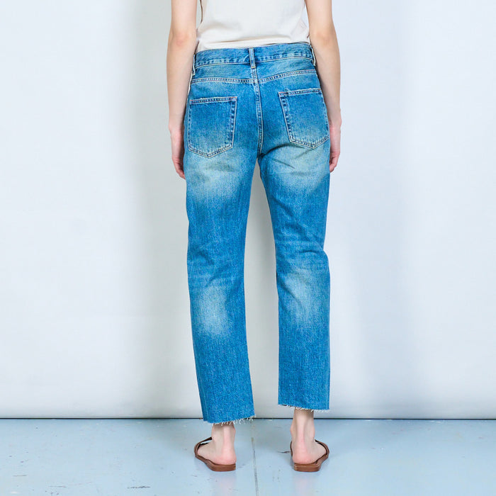 Distressed straight-leg cropped denim jeans with frayed hem detail wholesale