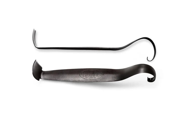MudTools Do-All Trim Tool in side and top views, black metal with a curved blade at one end and a hook at the other