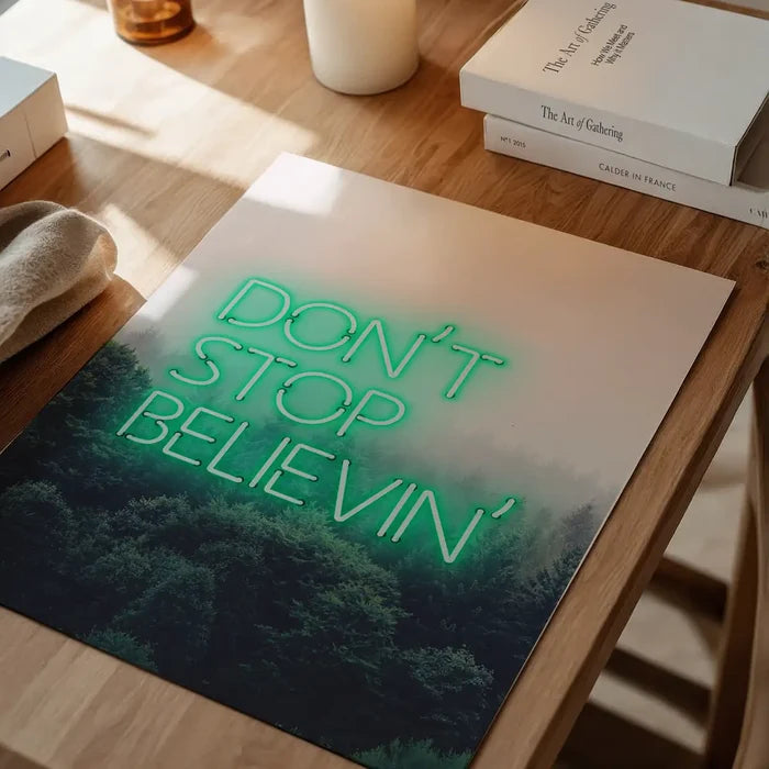 Dont Stop Believing Lyrics Neon Print, typography print unframed on a home office desk