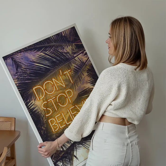Dont Stop Believing Lyrics Neon Tropical Print held up against a living room wall
