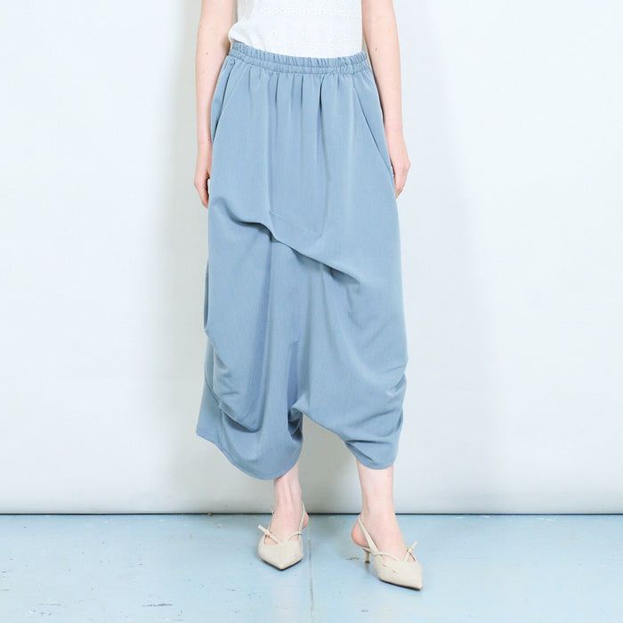 Draped elastic waist asymmetrical loose fit flowy trousers wholesale