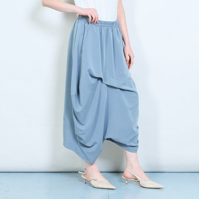 Draped elastic waist asymmetrical loose fit flowy trousers wholesale