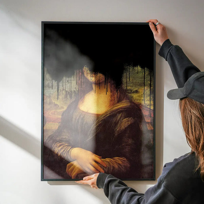 Drippy Mona Lisa Black Graffiti Print being hung on a wall in a black frame