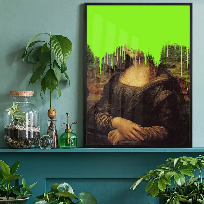 Drippy Mona Lisa Graffiti Print, quirky altered art print black framed on a living room shelf