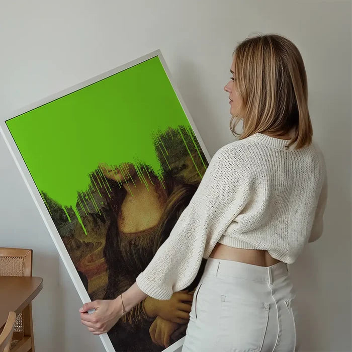 Drippy Mona Lisa Graffiti Print held up against a living room wall