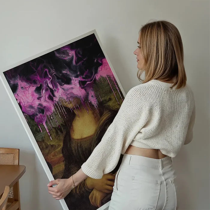 Drippy Mona Lisa Pink Gloop Print held up against a living room wall