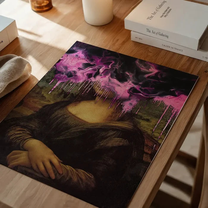 Drippy Mona Lisa Pink Gloop Print, quirky altered art print unframed on a home office desk