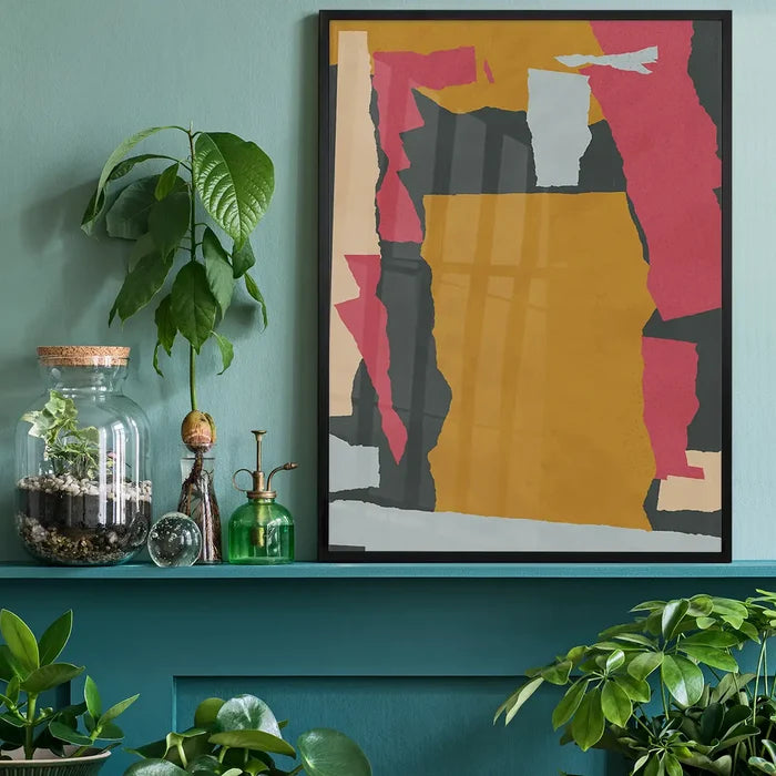 Earth Paper Collage 1 Print black framed on a living room shelf