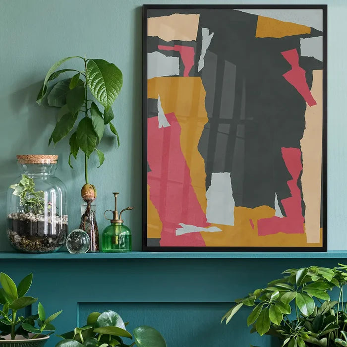 Earth Paper Collage 2 Print black framed on a living room shelf