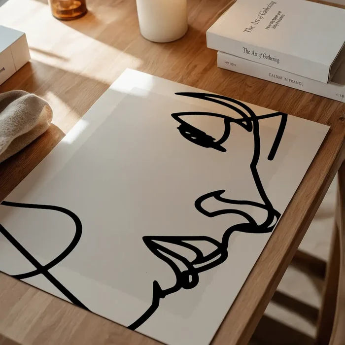 Face Close Up Line Art Print unframed on a home office desk