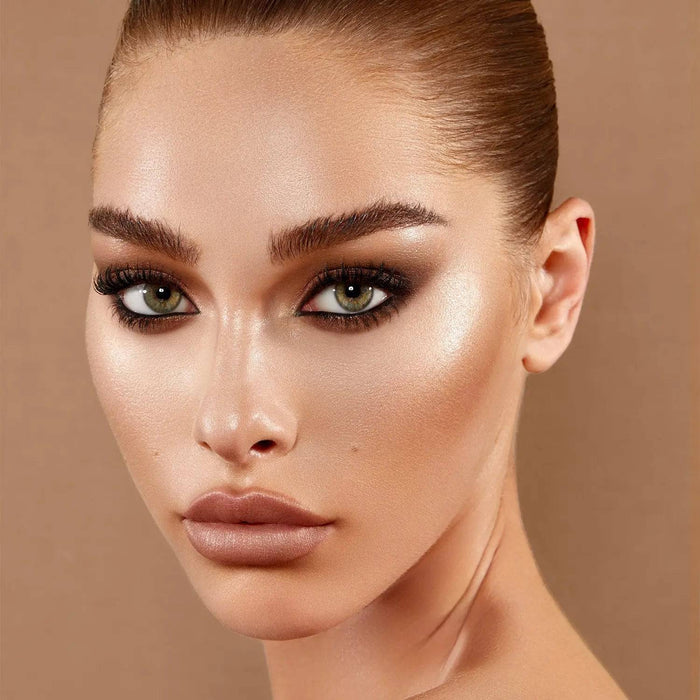 Face Glow Cream Shimmer model look on a light background.