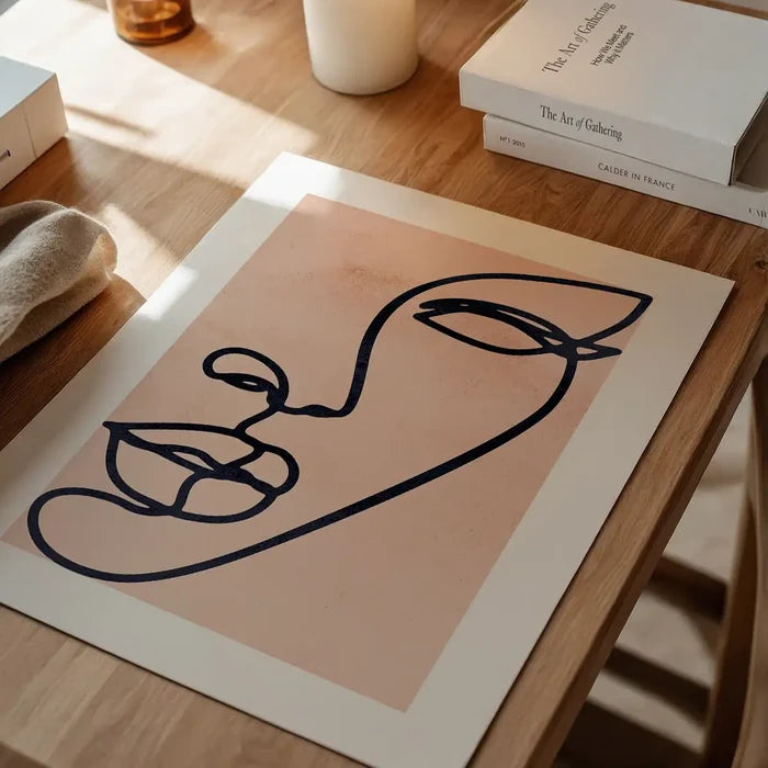 Face Study Line Art Watercolour Print unframed on a home office desk