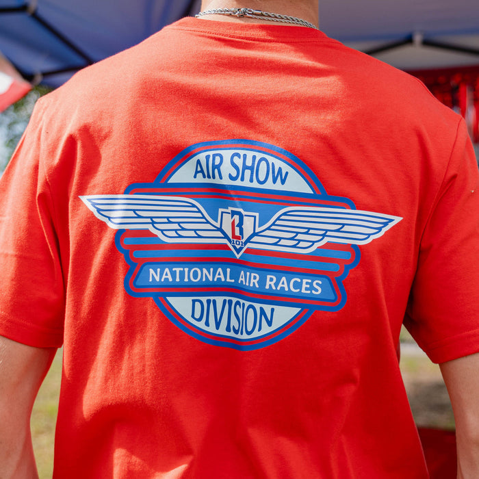 Detail back view of adult male model showing close-up of Air Show National Air Races Division badge on red tee