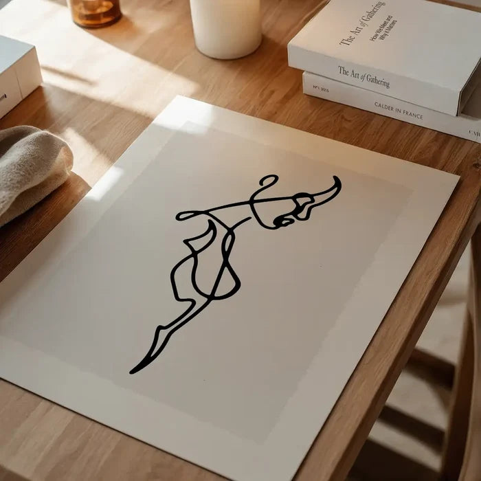 Female Side Study Line Art Print unframed on a home office desk