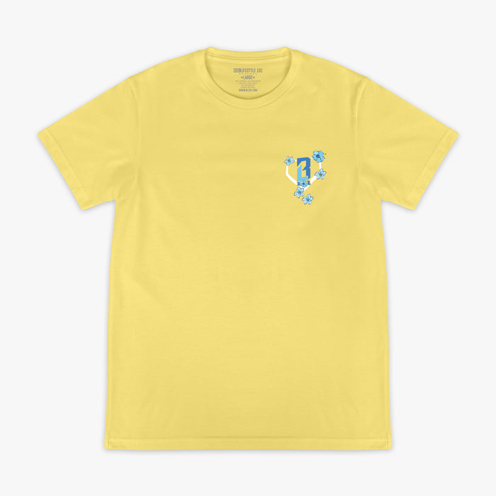 Yellow t-shirt with a blue floral design and BL101 logo on a white background