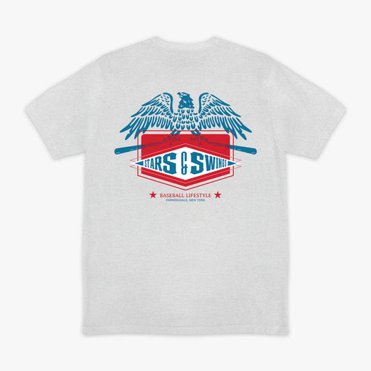 Heather gray short sleeve tee with blue spread-wing eagle above Stars and Swings badge graphic with crossed bats and Baseball Lifestyle Farmingdale New York text on white background