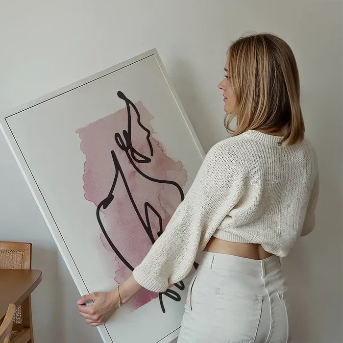 Glancing Watercolour Line Art Print held up against a living room wall