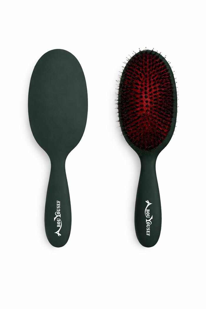 Green oval paddle hairbrush