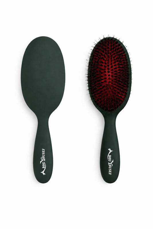 Green oval paddle hairbrush