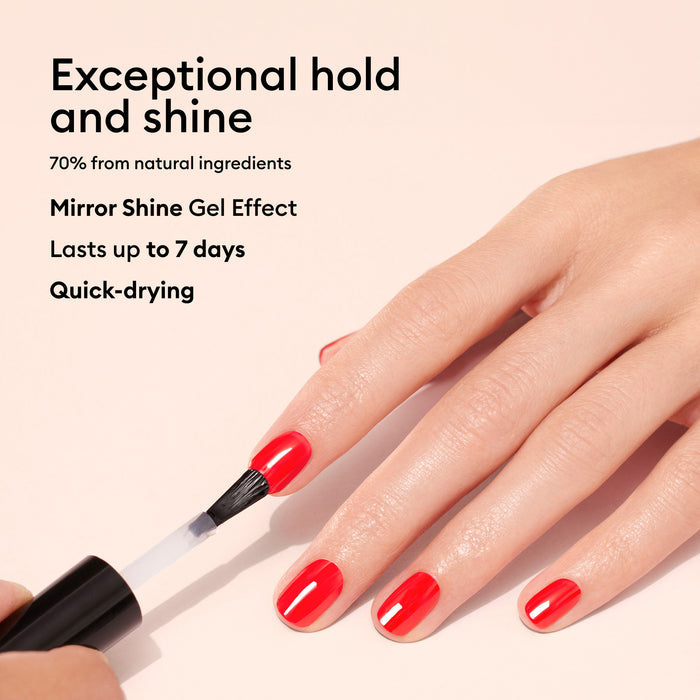 A hand with bright red manicured nails is being painted with Manucurist Green Sunshine Top Coat. Text highlights: plant-based formula, exceptional hold, mirror-shine gel effect, lasts up to 7 days, and quick-drying.