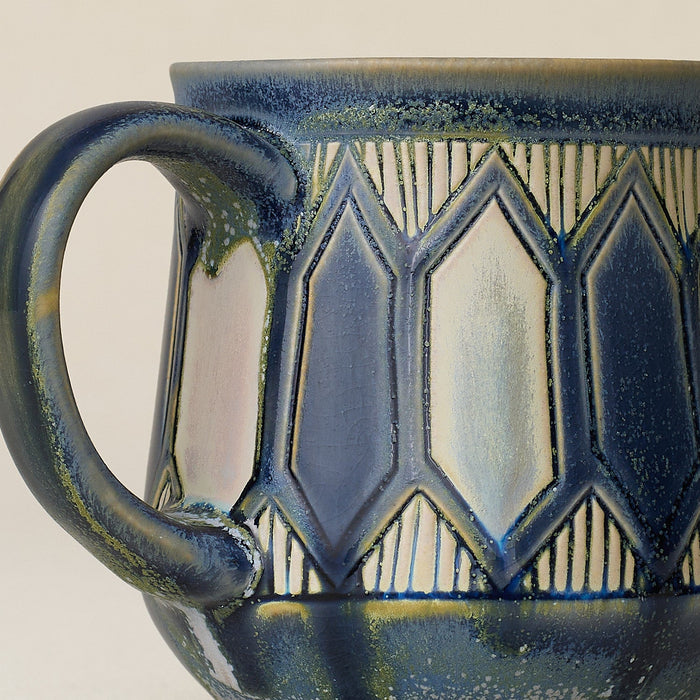 Close-up details of hand-thrown mug by Rookwood