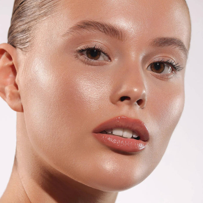 HY-GEN Skincare Infused Glow Beautifier in shade 01 model look on a white background.
